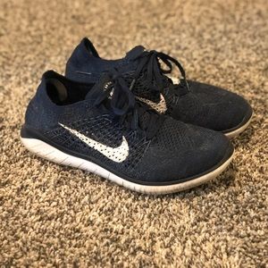 Nike Flyknit gym shoes mens 6/women’s 7.5
